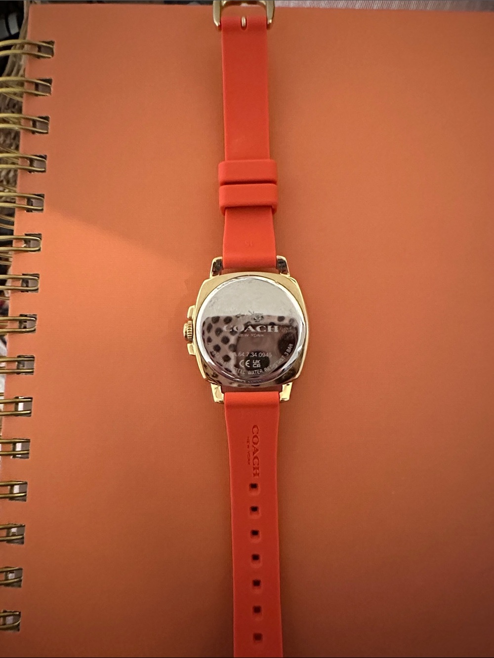 Coach Gold-Tone Case Smartwatch with Orange Silicone Strap